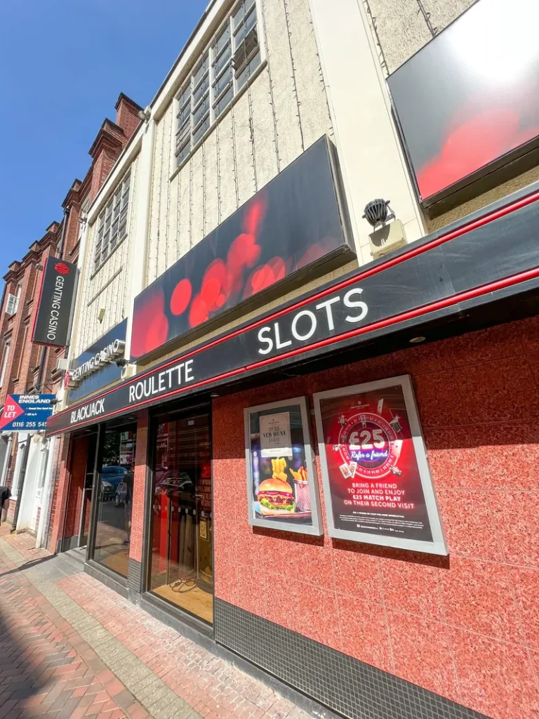 Daytime entrance of Genting Casino Leicester with slots signage