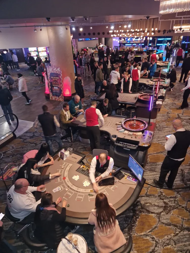Busy table games area inside Genting Casino Sheffield