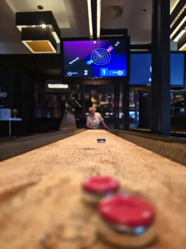 Shuffleboard table inside Genting Casino Stratford