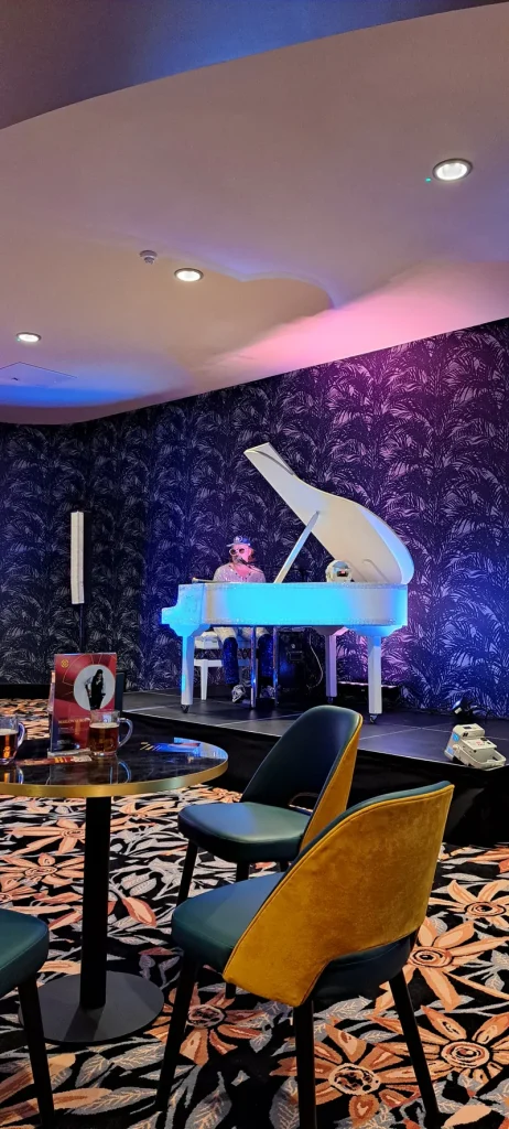 Live piano stage inside Grosvenor Casino Didsbury