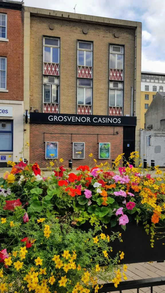 Grosvenor Casino Hull facade with colourful flower planters