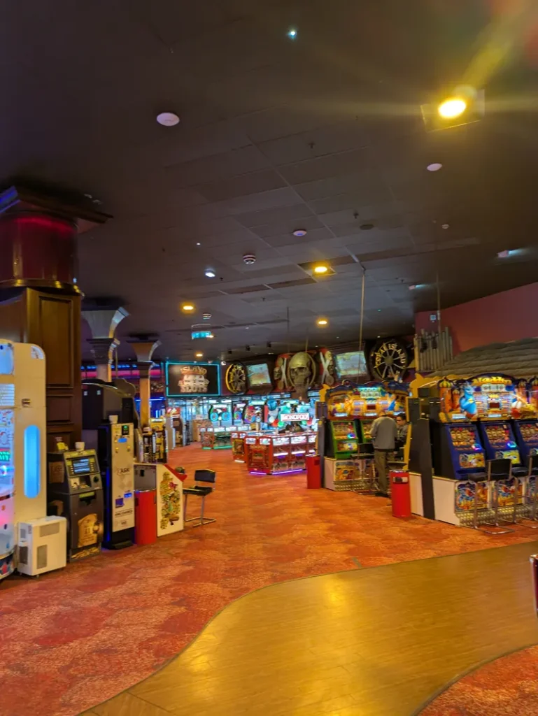 Coral Island Casino arcade floor with bright slot machines