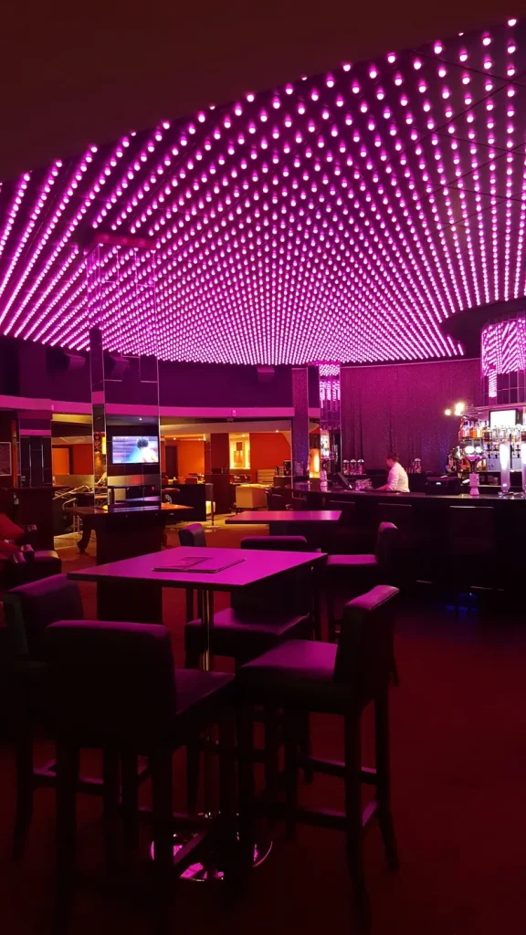 Pink ceiling lights above the bar at Grosvenor Casino Aberdeen