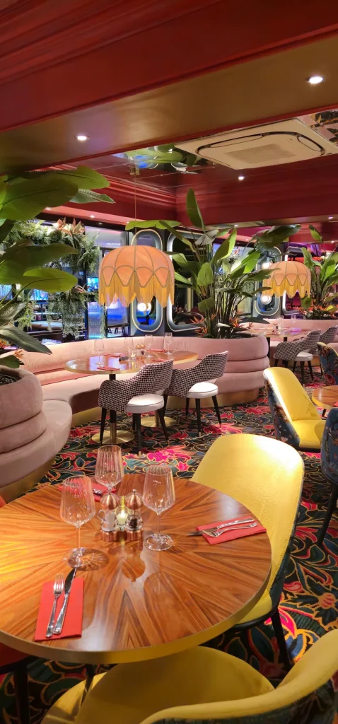 Colourful restaurant seating inside Grosvenor Casino London Bayswater