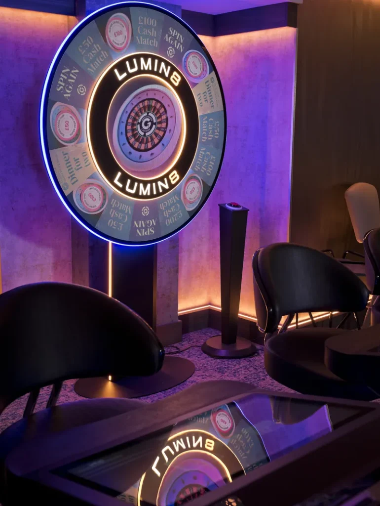 Illuminated prize wheel inside Gloucester Road Casino