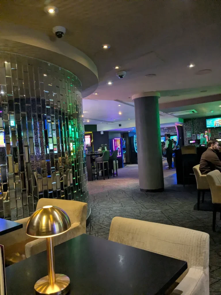 Casino lounge with seating and slot machines