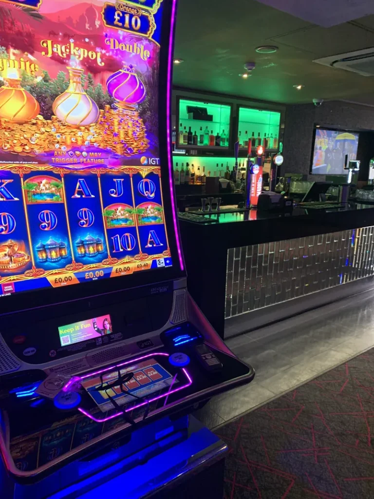 Slot machine beside the casino bar