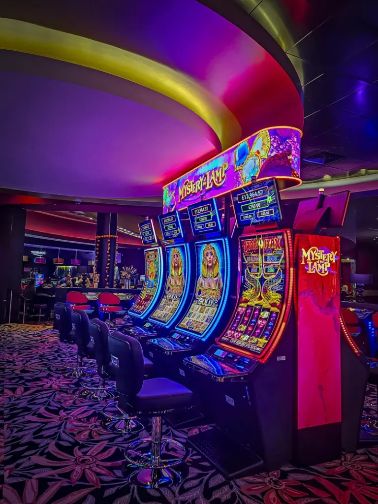 Bright slot machines inside Grosvenor Casino Reading South
