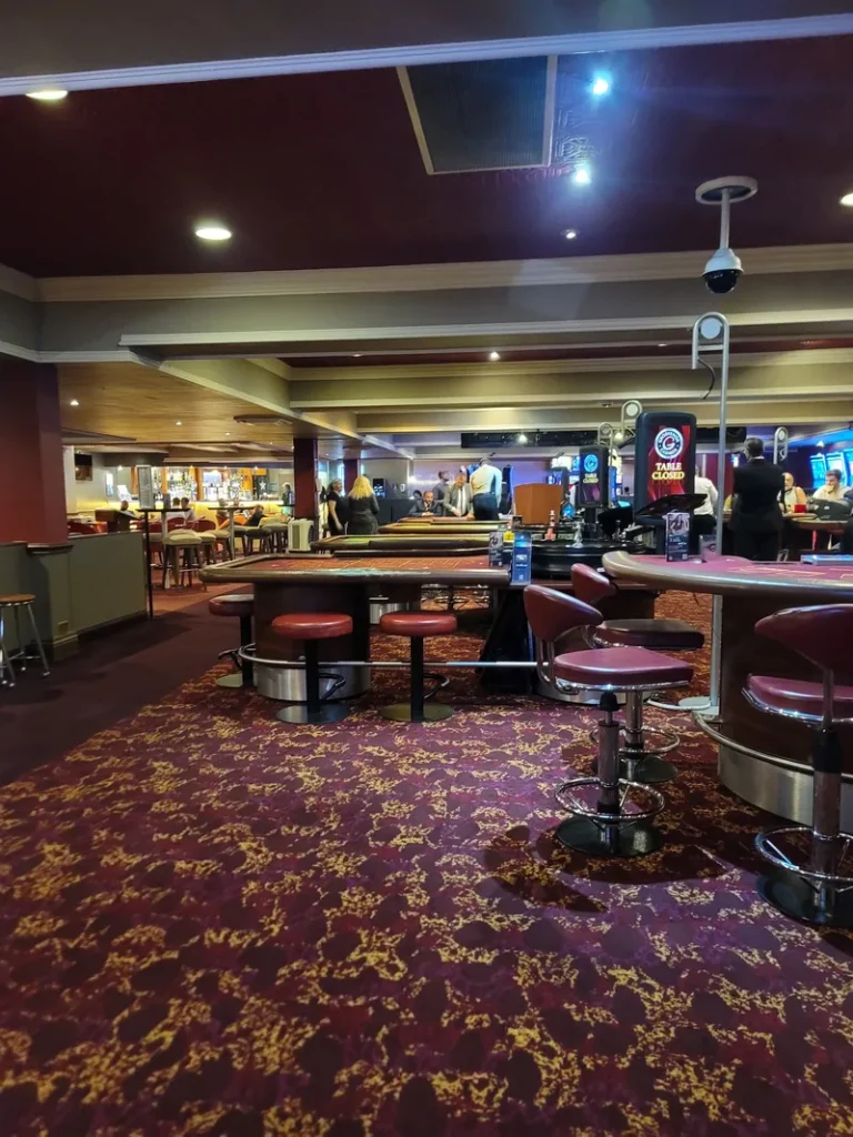 Gaming floor with roulette tables at Grosvenor Casino Swansea