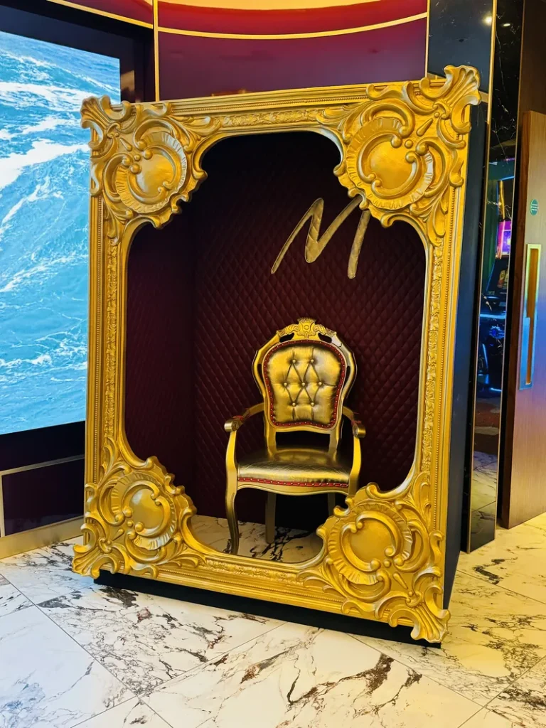 Metropolitan Mayfair interior with gold frame and chair