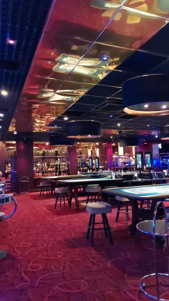 Napoleons Casino Leeds table games area with red carpet